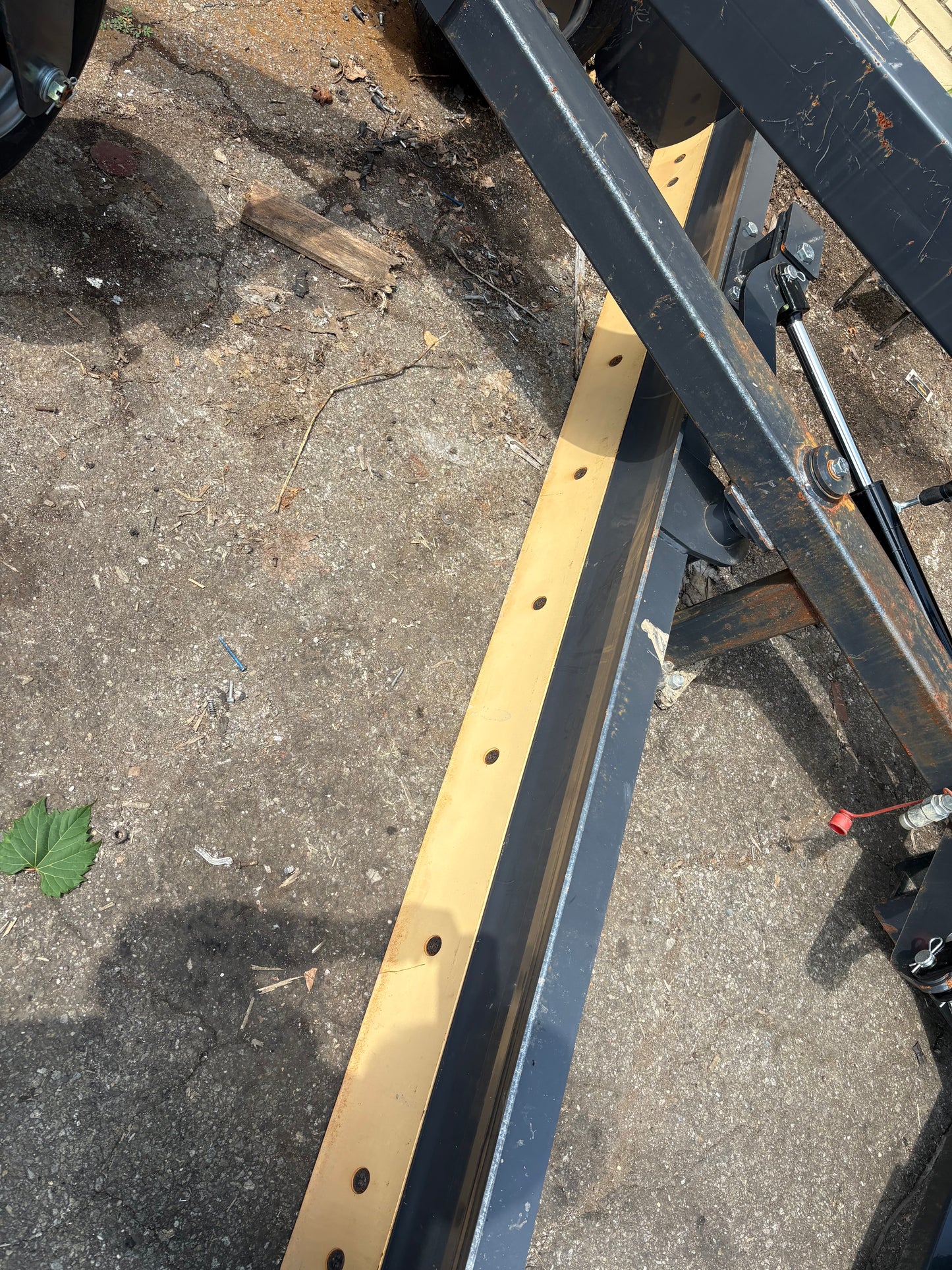 Skid steer grader blade