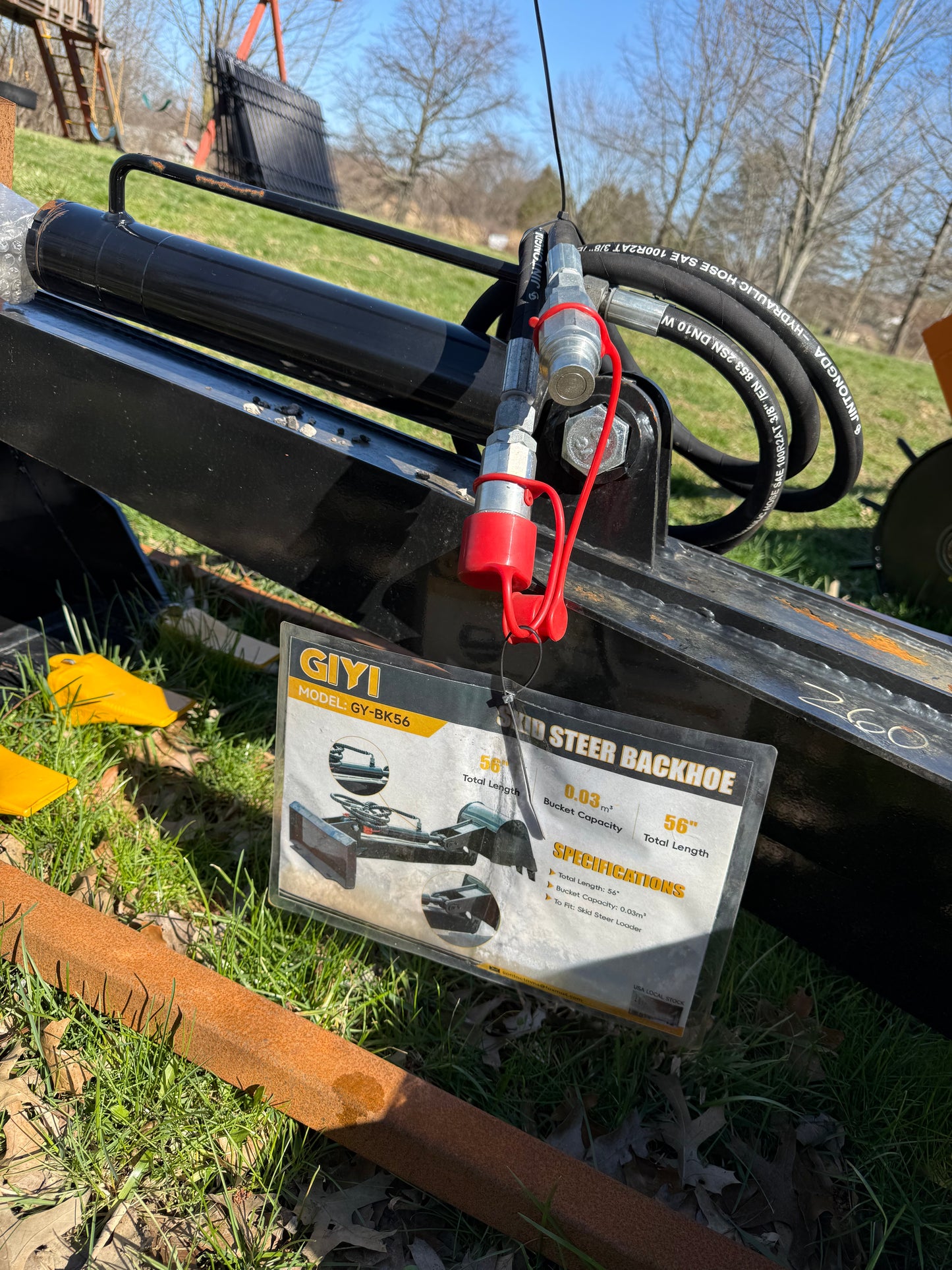 Skid steer backhoe